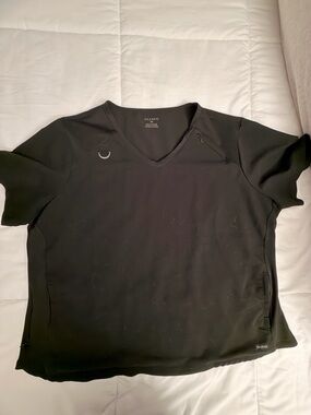 Jaanuu Black Scrub Top with Subtle Logo